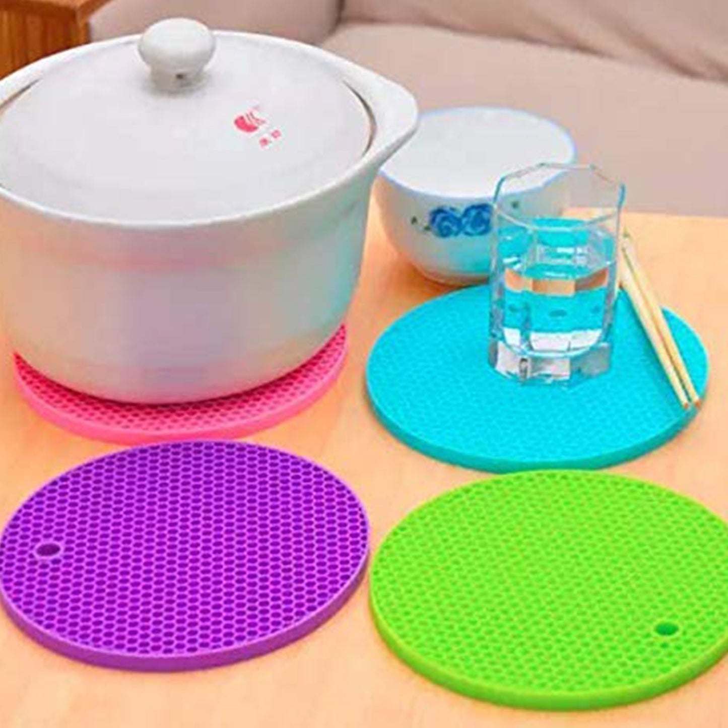 4 Pc Silicon Hot Mat For Placing Hot Vessels And Utensils Over It Easily Without Having Any Visible Marks On Surfaces.